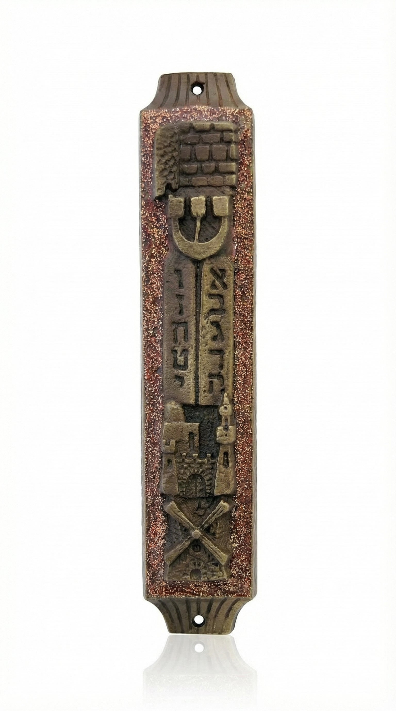 Handcrafted brass Mezuzah case with Ten Commandments relief and Hebrew inscriptions, made in Israel for Jewish tradition and protection.