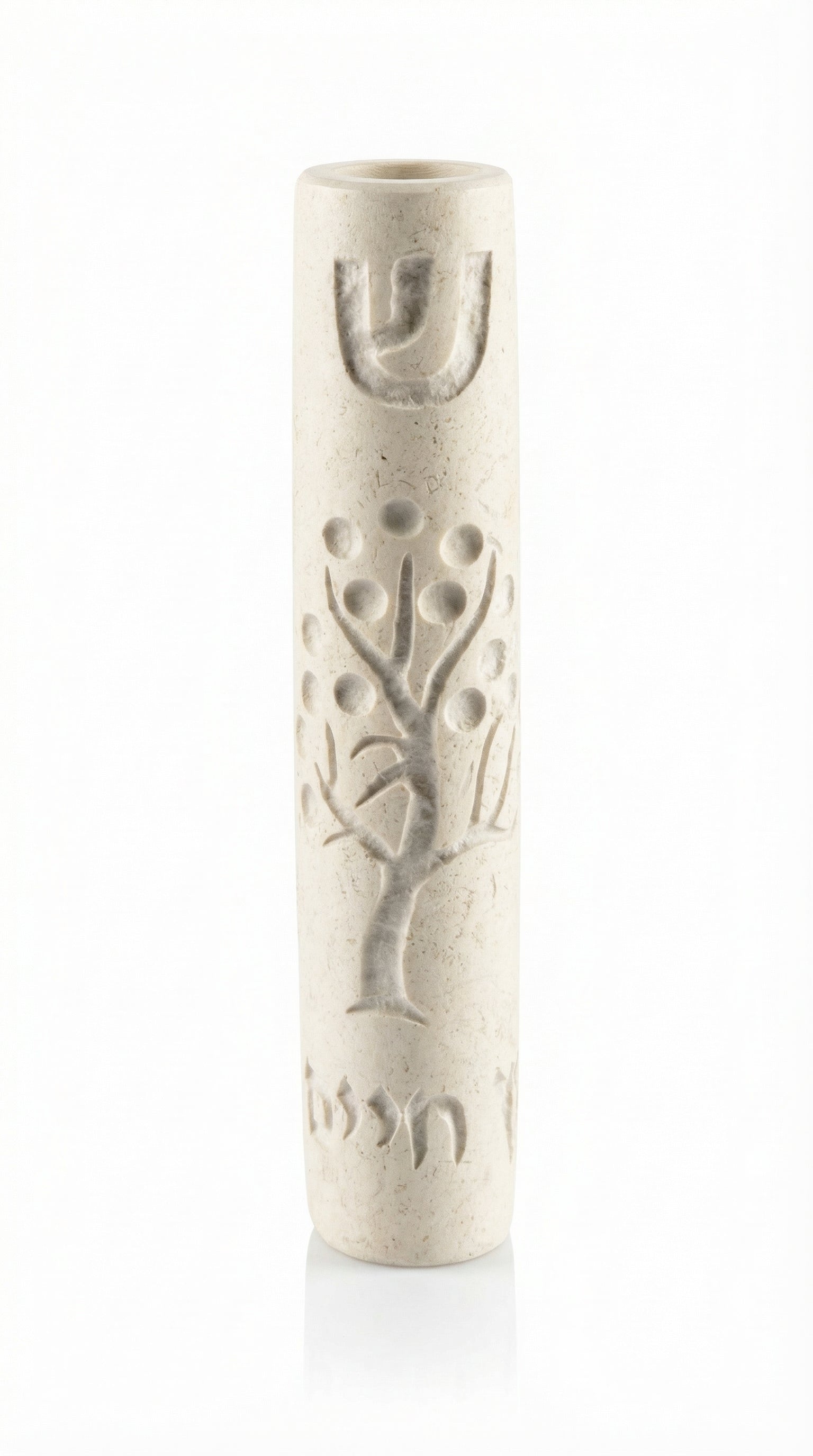 Cream-colored Jerusalem stone Tree of Life Mezuzah with engraved Hebrew letters and decorative motifs, on a white background with a soft reflection.
