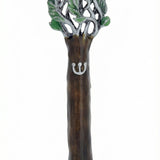 Pewter Tree of Life Mezuzah reflecting symbolism of the Torah as a tree of life, detailed engraving, on a white studio surface with soft reflection.