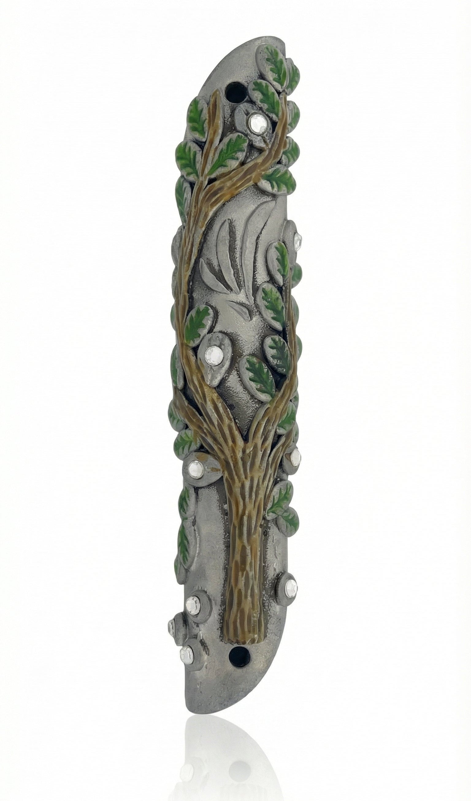 High-resolution image of an intricately designed Tree of Life Mezuzah with precise details, set against a pure white background with soft reflection.