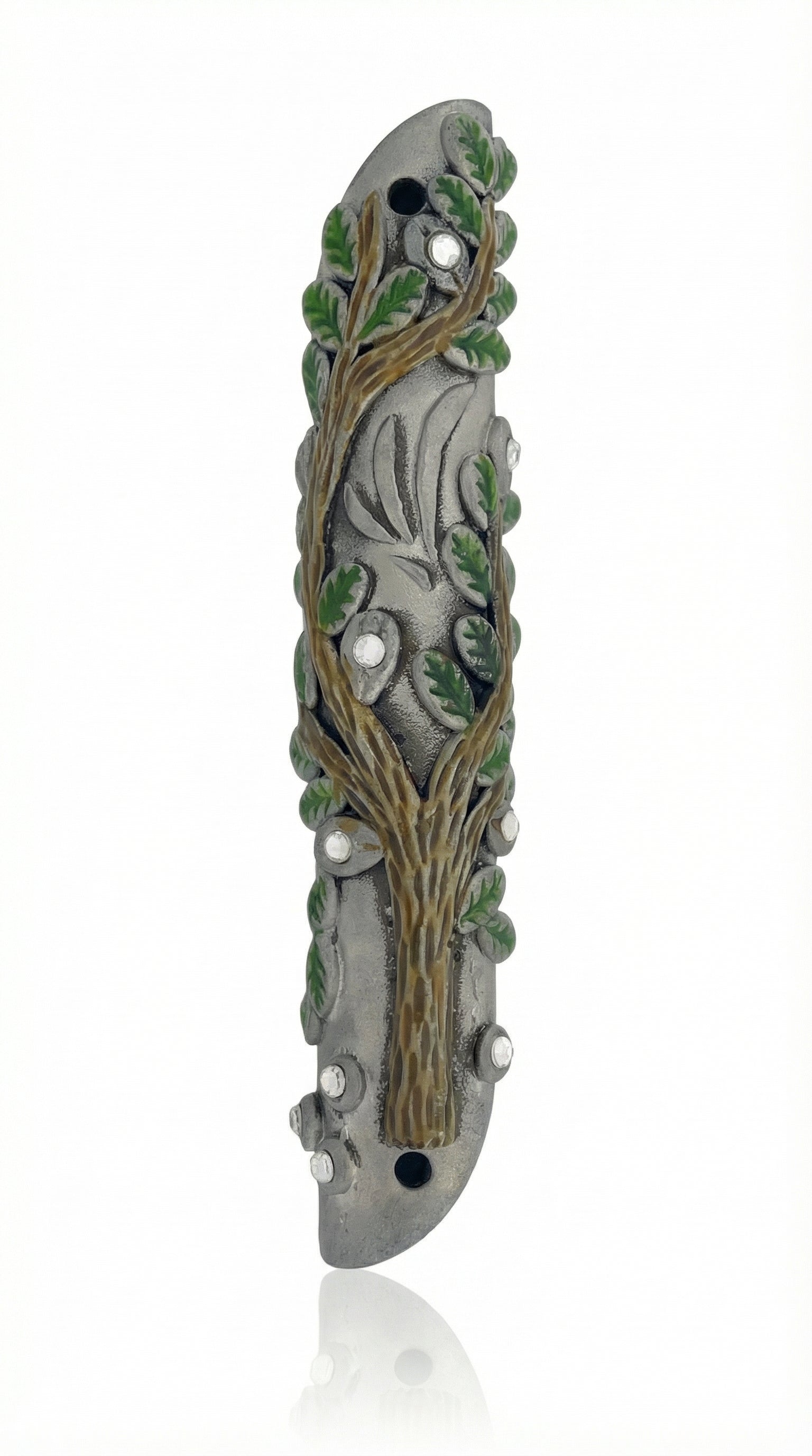 High-resolution image of an intricately designed Tree of Life Mezuzah with precise details, set against a pure white background with soft reflection.