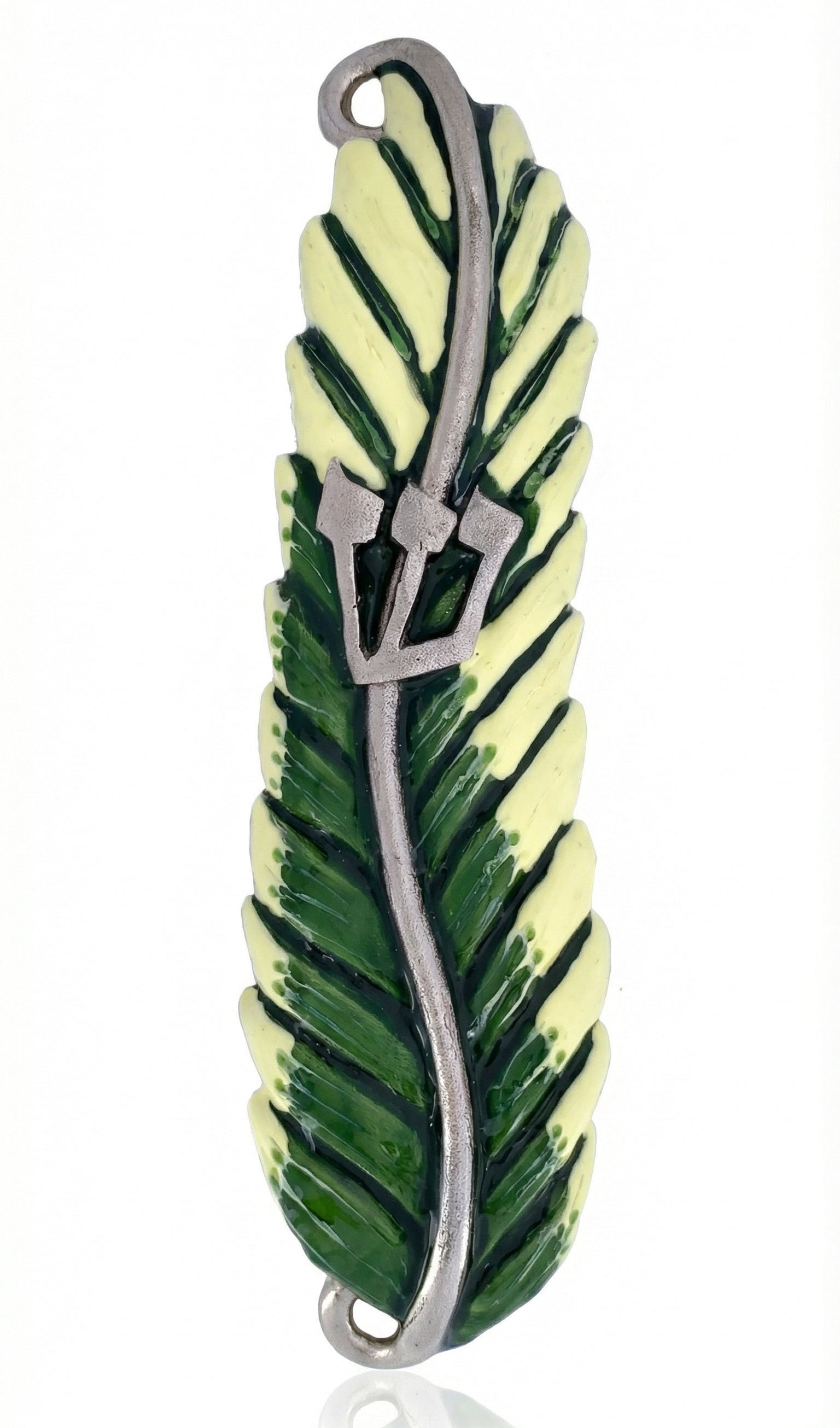 Upscaled, detailed image of a pewter mezuzah with tropical palm leaf design, hand painted with enamel, on a white studio background with soft reflection.