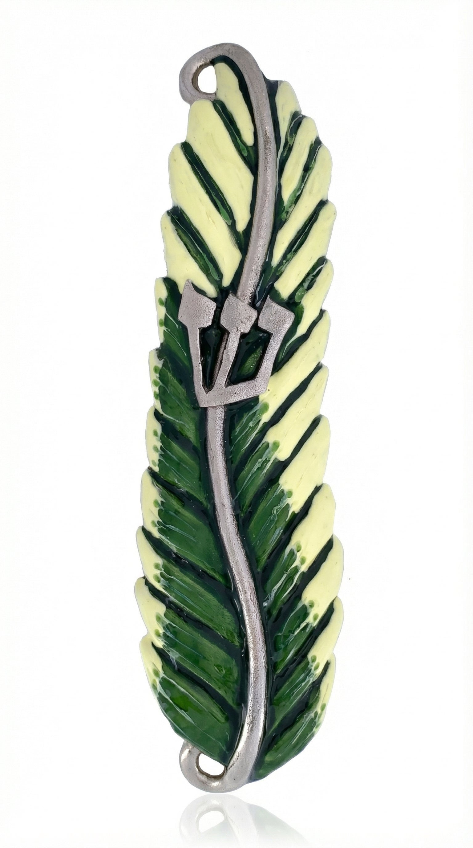 Upscaled, detailed image of a pewter mezuzah with tropical palm leaf design, hand painted with enamel, on a white studio background with soft reflection.