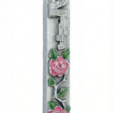 Made in USA pewter mezuzah with two roses design, measuring 5 inches tall, suitable for home doorways with clear engraved details and decorative motifs.