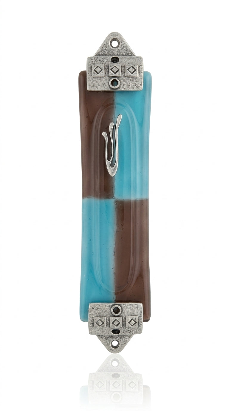 Elegant hand-painted aqua and brown glass mezuzah with silver-plated accents, displayed on a white studio background with a soft reflection.
