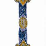 Elegant Tzfat Mezuzah with blue enamel and detailed Kabbalistic motifs, made of pewter, displayed on a white studio surface with a subtle reflection.