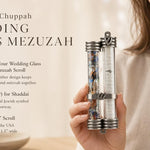 Wedding glass mezuzah with dual-tube design displaying broken glass and kosher scroll in a sculptural pewter frame, perfect for Jewish home doorways.
