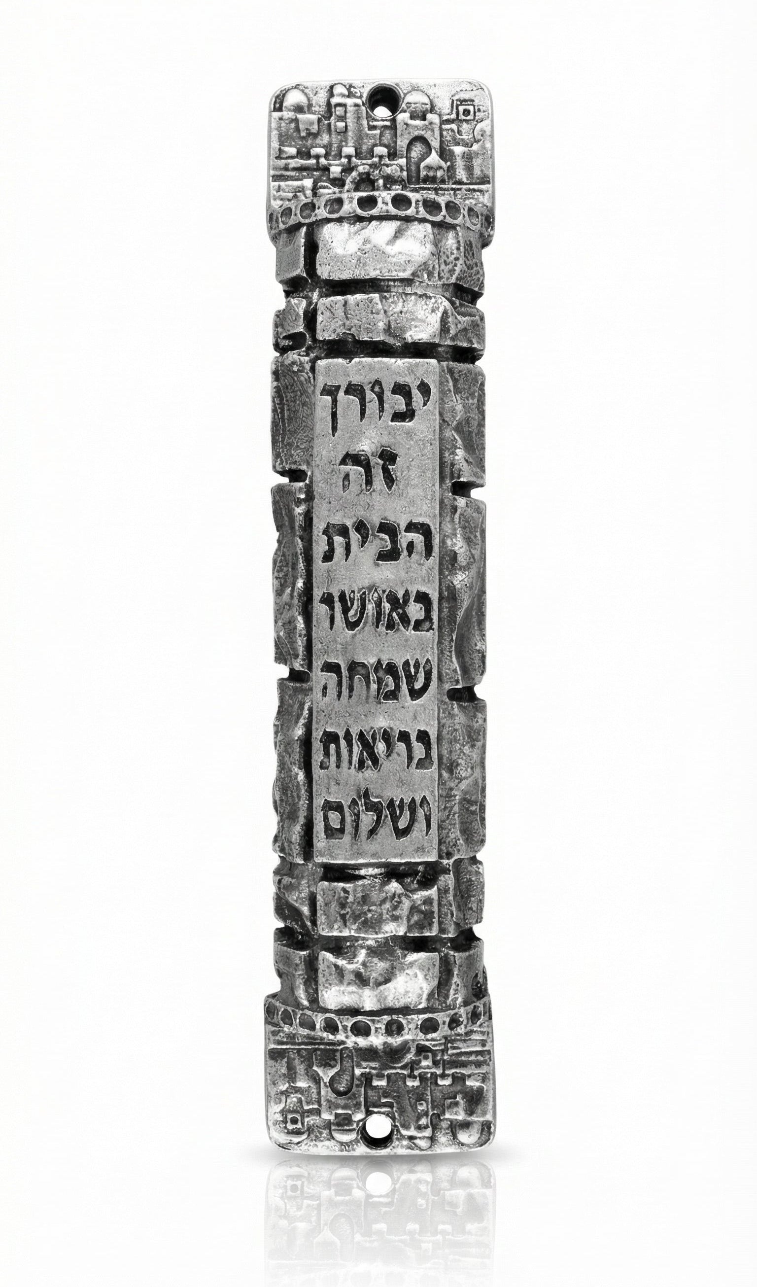High-resolution image of a pewter Jerusalem Mezuzah with Hebrew engravings, on a white studio background with a soft reflection below.
