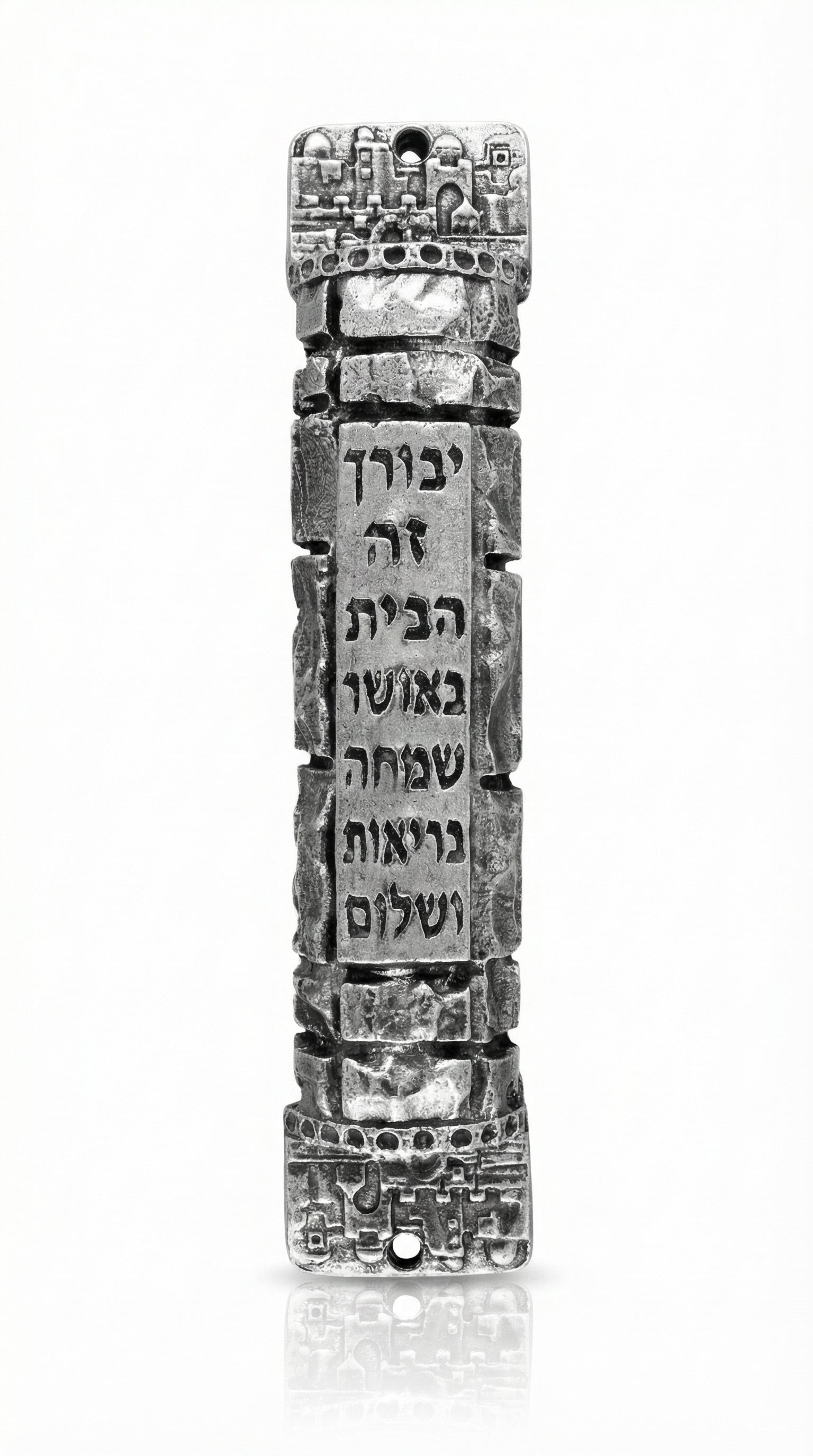 High-resolution image of a pewter Jerusalem Mezuzah with Hebrew engravings, on a white studio background with a soft reflection below.