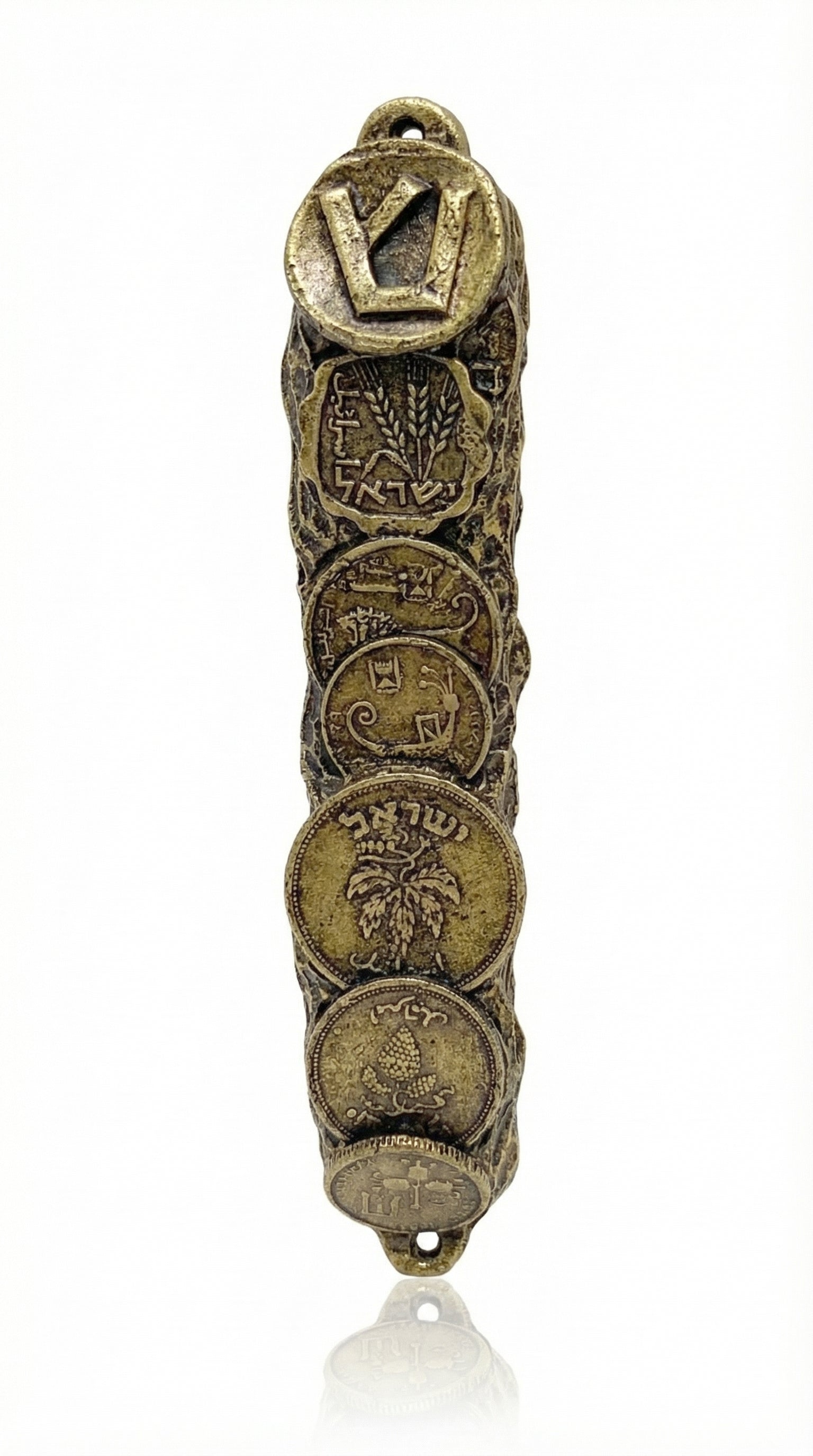 Vintage Coins of Israel Brass Mezuzah with textured coin imagery and Hebrew elements on a white background with a subtle reflection.
