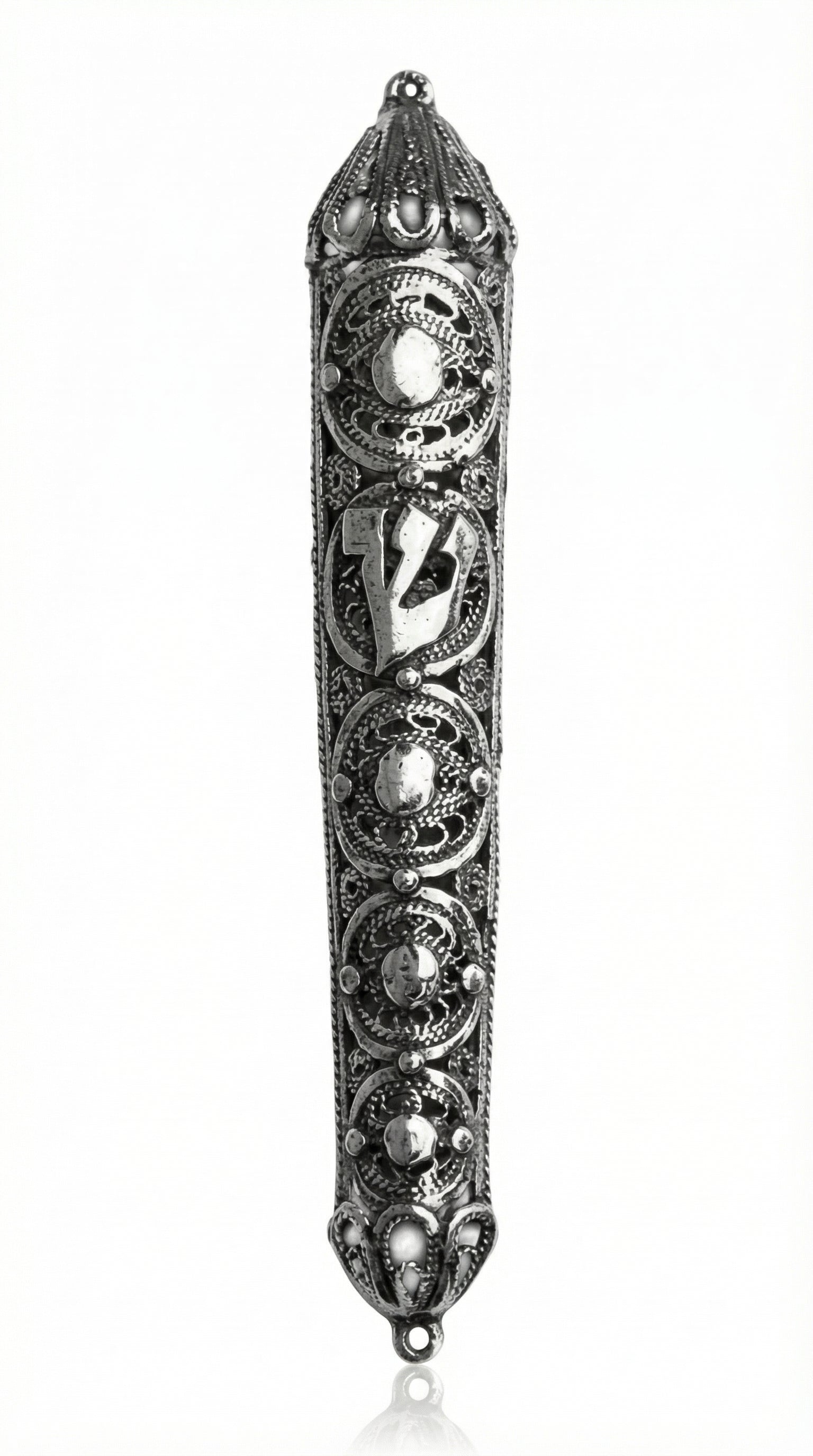 Sterling silver vintage-inspired filigree mezuzah with detailed craftsmanship, Hebrew inscriptions, and decorative motifs made in Israel.