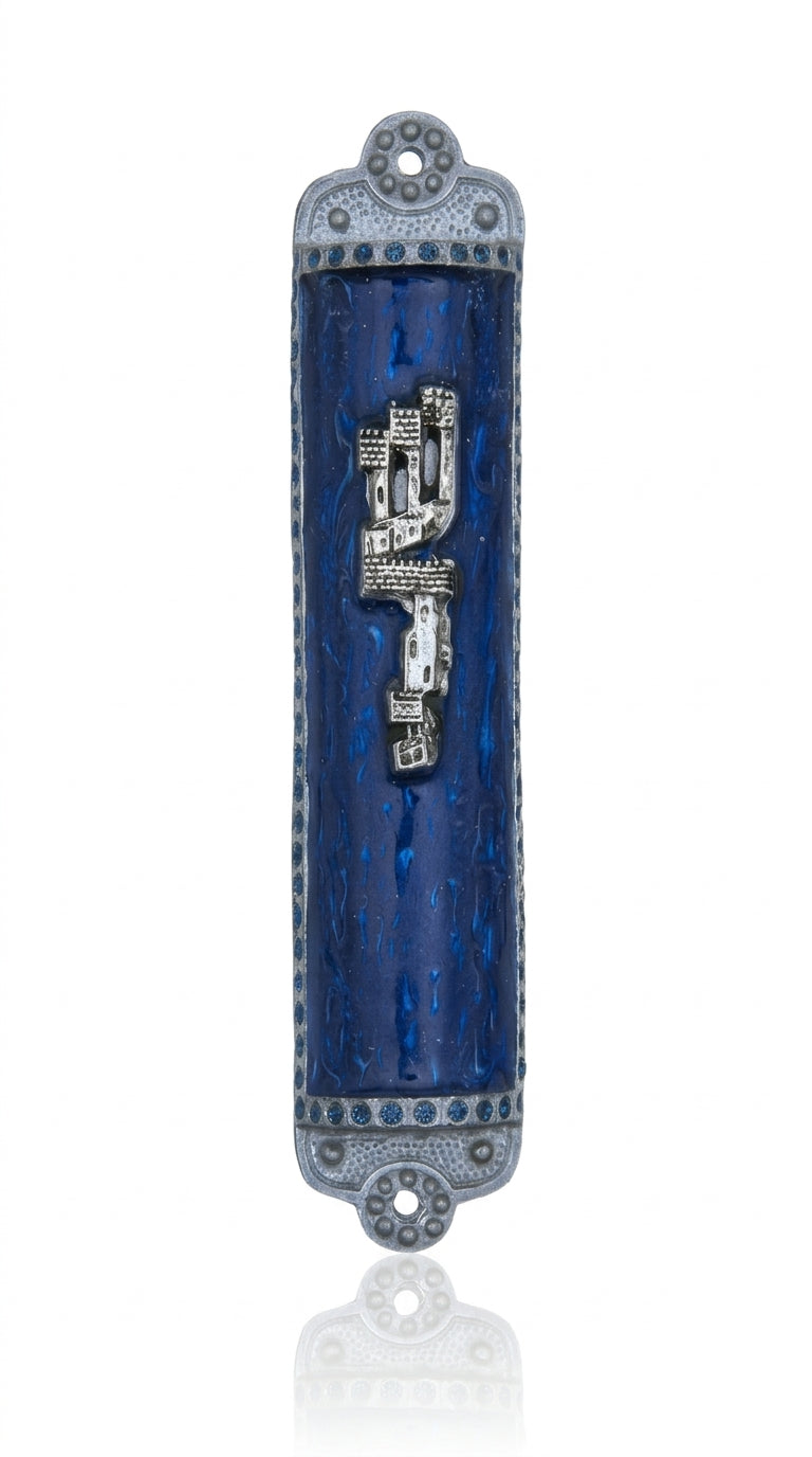 Embellished pewter Mezuzah with Hebrew sha-dai in a professional studio setting on a white background, with soft reflection.
