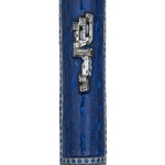 Embellished pewter Mezuzah with Hebrew sha-dai in a professional studio setting on a white background, with soft reflection.