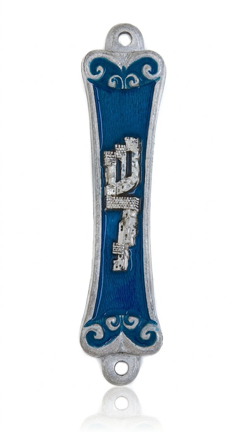 Pewter mezuzah featuring the 'Sha-dai' name built as city walls, with Hebrew letters, decorative motifs, and a white studio background.