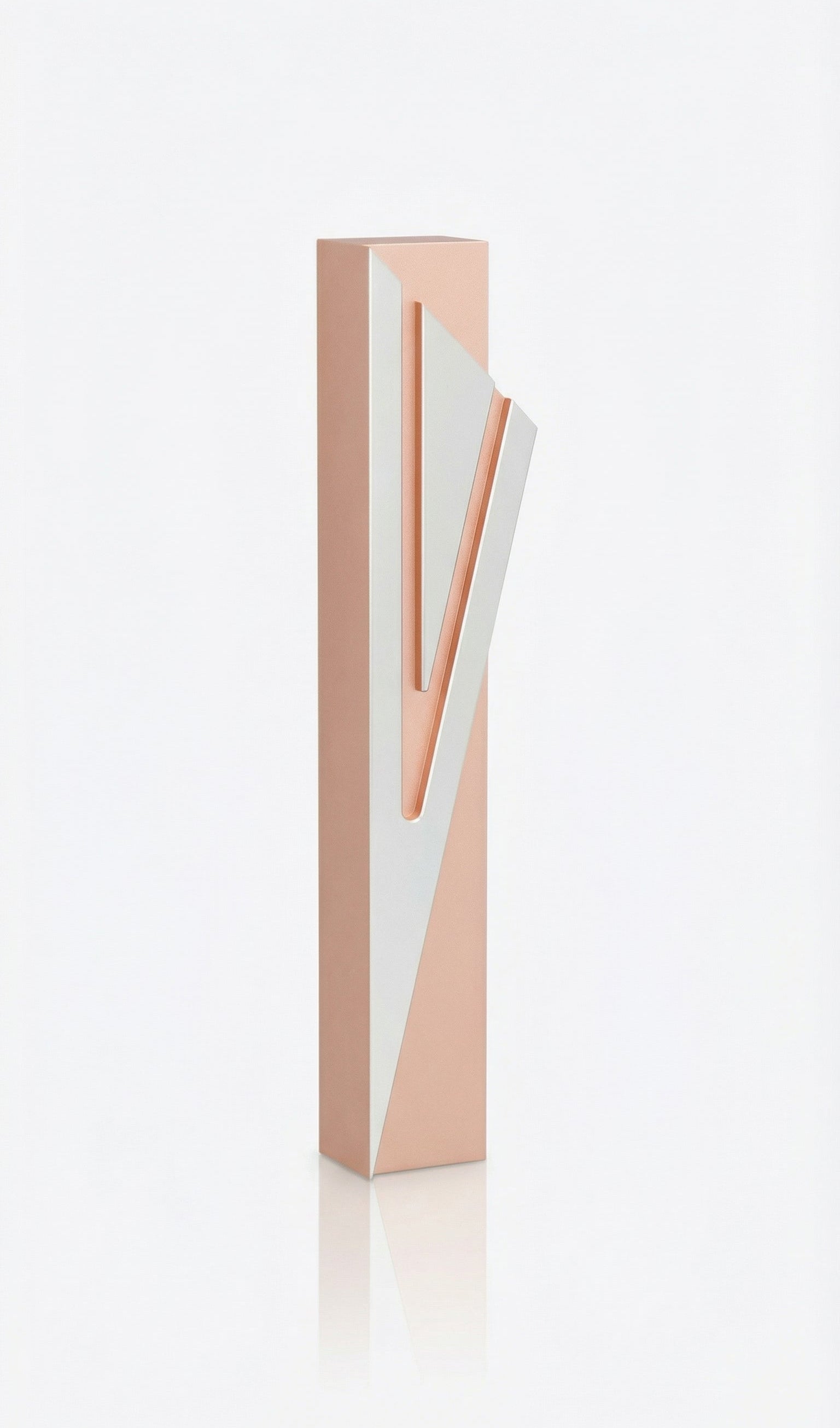 Modern Capital Shin pink aluminum mezuzah case on white with a soft pink body and a large angular silver Hebrew Shin