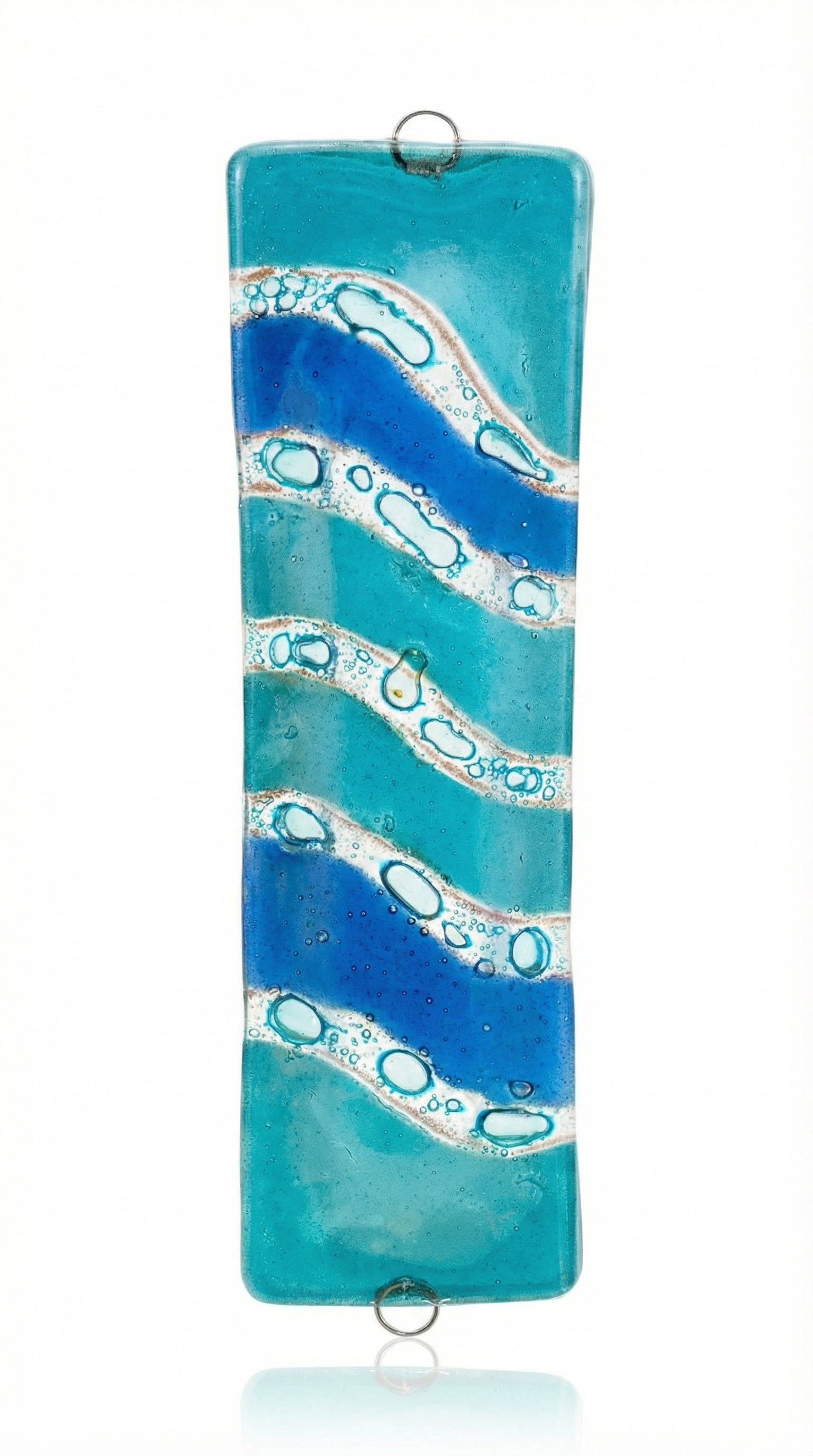 Elegant glass mezuzah measuring 4.5 inches tall with detailed Hebrew engravings, decorative motifs, and precise craftsmanship for home blessing.