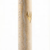 Handcrafted wedding Mezuzah made from natural Jerusalem stone, featuring engraved Hebrew letters and decorative motifs