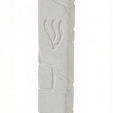 White cement mezuzah measuring 6 inches tall with Hebrew engravings, mounted with strong adhesive on a white studio background with soft reflection.