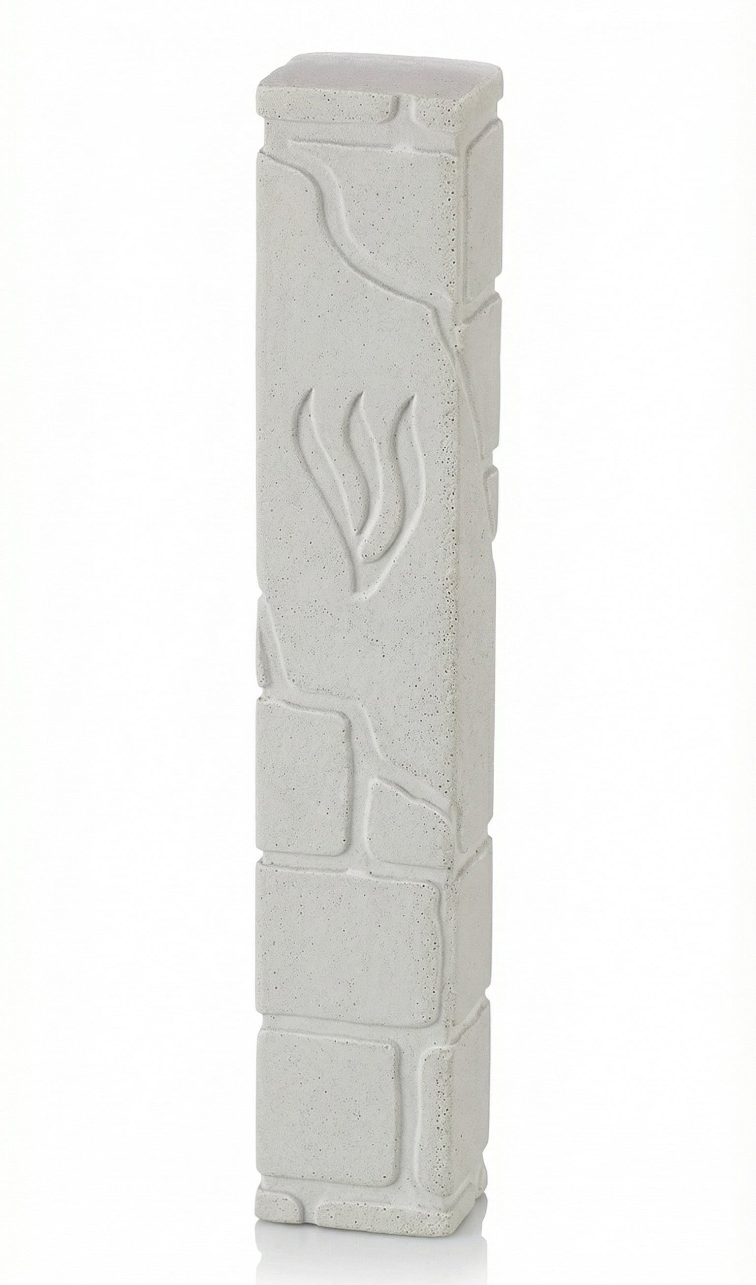 White cement mezuzah measuring 6 inches tall with Hebrew engravings, mounted with strong adhesive on a white studio background with soft reflection.