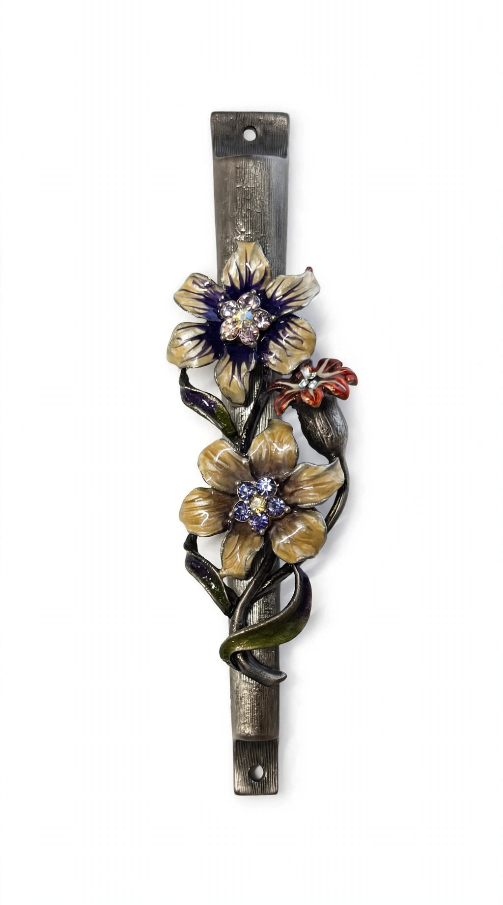 Wildflower Garden Pewter Mezuzah shown from the front as a mezuzah cover featuring yellow and purple flowers with sparkling centers, a small reddish blossom and green curling leaves along a textured silver-toned pewter stem, presenting a detailed Judaica design for a Jewish home doorway