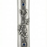 Wildflowers mezuzah with sky blue accents, detailed floral carvings, and Hebrew inscriptions, displayed on a white studio background with soft reflection.